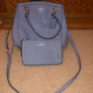 Pastel blue coach purse and matching wristlet